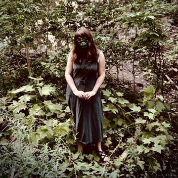 me masked up and standing in a swamp